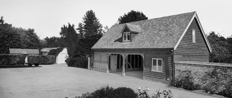 Large oak framed garage with accommodation above.